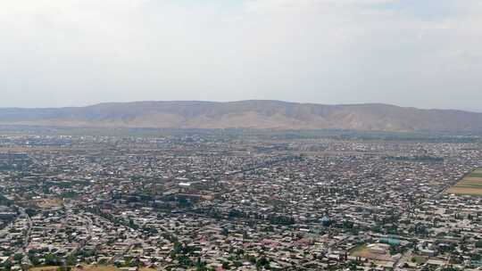 吉尔吉斯斯坦贾拉拉巴德市鸟瞰图视频素材模板下载