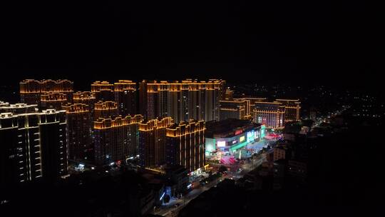 城镇小区广场夜景航拍城市夜景楼房住宅小区