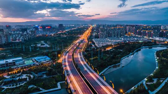 中国内蒙古呼和浩特市牛角桥航拍夜景延时视频素材模板下载
