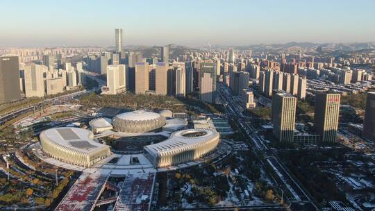 城市航拍济南奥体中心冬天雪景视频素材模板下载