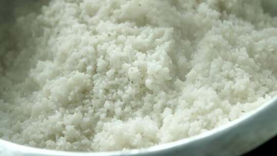 白米饭出锅搅拌  高清素材
