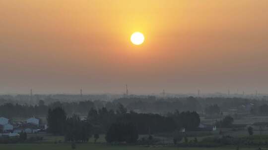 航拍乡村田野日出全景