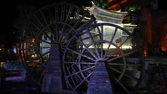 云南旅游5A级丽江古城地标水车灯光夜景视频素材模板下载
