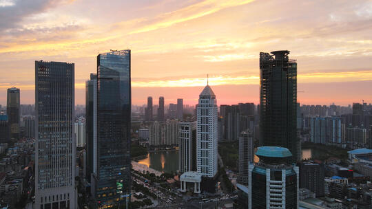 航拍武汉城市天际线高楼群夕阳晚霞落日