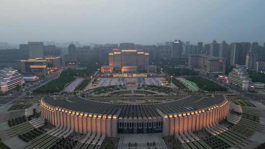 河南新乡市城市夜幕降临夜景灯光航拍视频素材模板下载