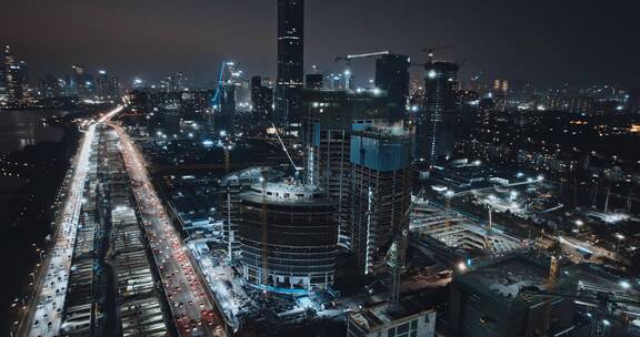 航拍深圳湾超级总部建设进展夜景