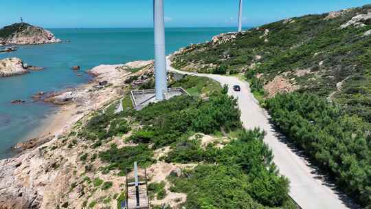 汽车行驶在海边公路航拍风景旅拍旅行自驾游