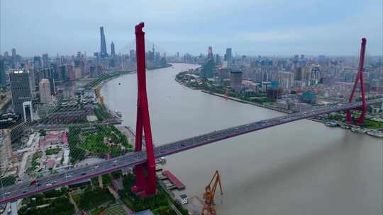 上海市浦东新区杨浦大桥城市车流船只船舶夜