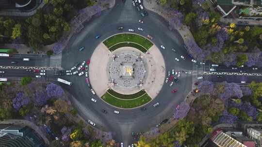 头顶拍摄的环岛纪念碑的独立天使，忙于汽车，墨西哥视频素材模板下载