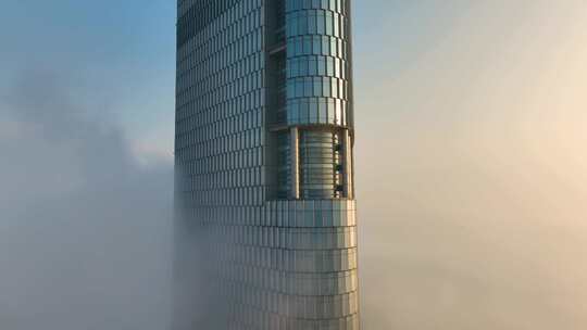 航拍云海中的南京紫峰大厦