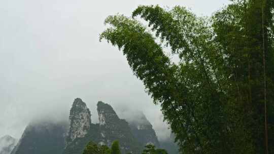 农村下雨雨景远山云雾雨季小雨