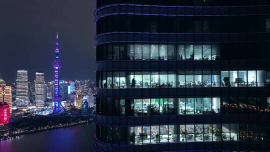 航拍上海商务楼白领加班忙碌夜景