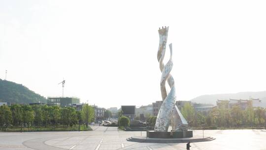 航拍瑶族盘王节女书文化广场图腾雕塑环绕视频素材模板下载