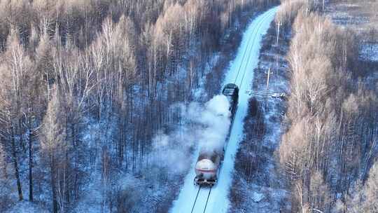 航拍大兴安岭雪原列车视频素材模板下载