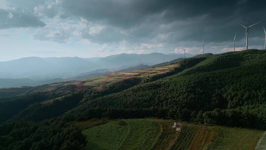 云南旅游乡村振兴风光红土地山顶电力风车视频素材模板下载