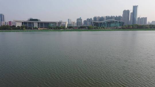 武汉琴台航拍两栋建筑主水面荷花视频素材模板下载