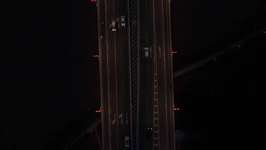 俯拍城市跨河大桥夜景交通