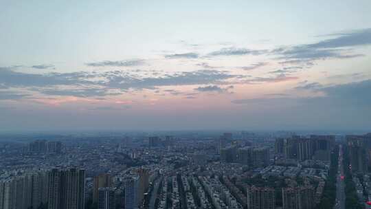 夕阳下的眉山城市风光航拍