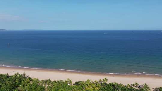 航拍三亚海棠湾沙滩海浪海岸线海景酒店蓝天