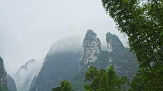 农村下雨雨景远山云雾雨季小雨