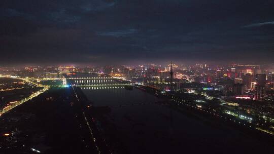 城市航拍洛阳阴雨天后城市云海夜景建筑