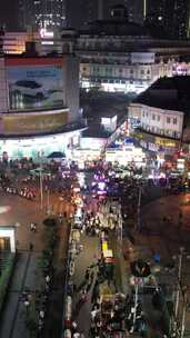 竖版航拍广西南宁城市夜市摊街景人流