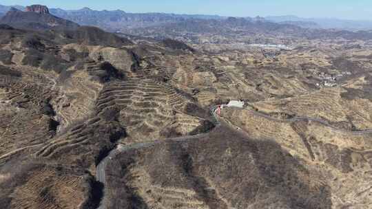 航拍蜿蜒盘旋的山间公路