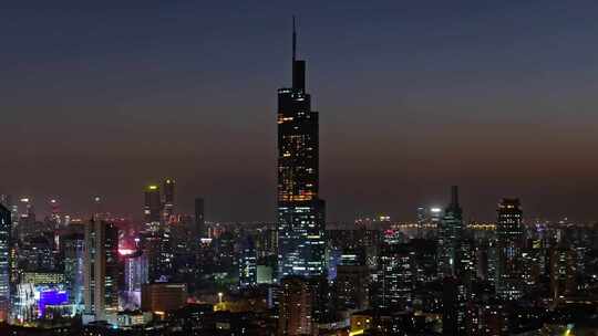 江苏南京CBD紫峰大厦建筑群日落夜景航拍