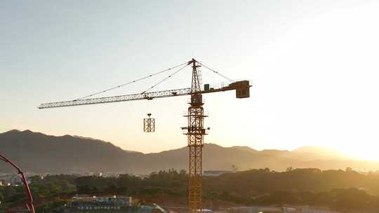 建筑工地航拍乡村建设农村开发吊塔日出工地