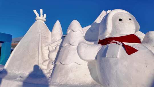 雪雕雪人造型与帐篷等景观