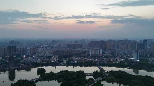 夕阳下的眉山城市风光航拍