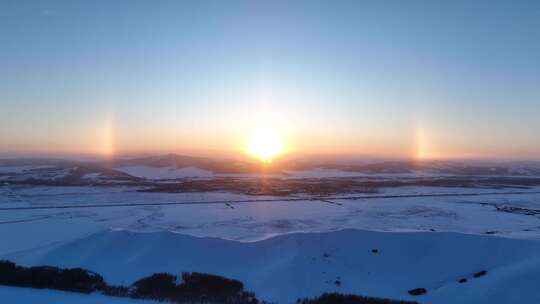 航拍雪域雪原灿烂夕阳