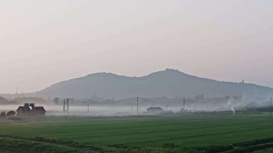 远山田野村庄小镇日出美景