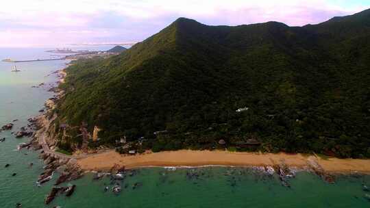 航拍海南三亚大小洞天灯塔椰林海浪礁石沙滩