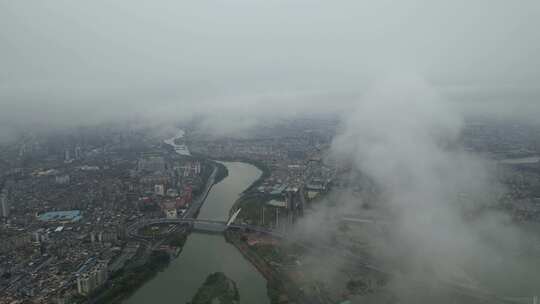航拍烟雨下的广东城镇