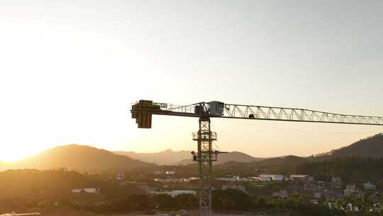 建筑工地航拍乡村建设农村开发吊塔日出工地