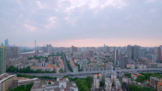 广州天空日出朝霞云彩与城市建筑群