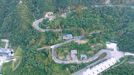 航拍4K夏天农村盘山路回旋山路崎岖道路