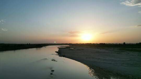 西安夕阳河滩黄昏日落晚霞渭河黄河流域航拍