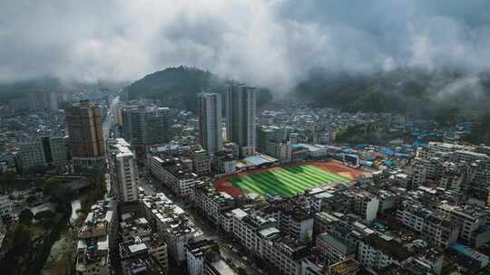 城市航拍小山城建筑交通云雾大景