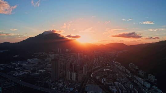 航拍深圳盐田梧桐山方向日落夕阳