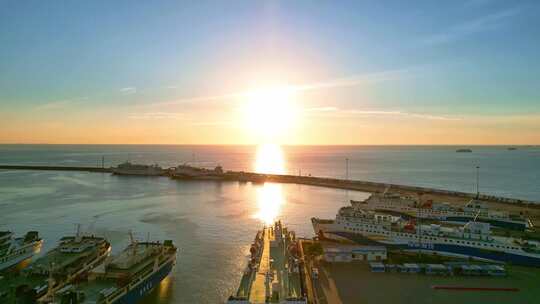 海南海口新海客运枢纽港口航拍日落金色时刻