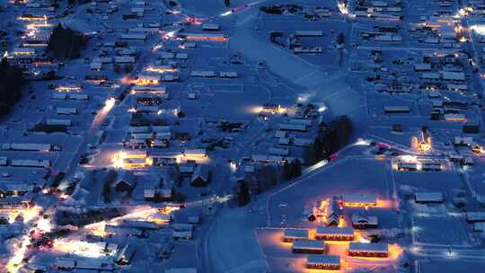新疆阿勒泰冬季禾木村蓝调震撼航拍风景夜景视频素材模板下载