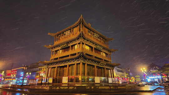 山西大同古城鼓楼夜景飘雪下雨雪景