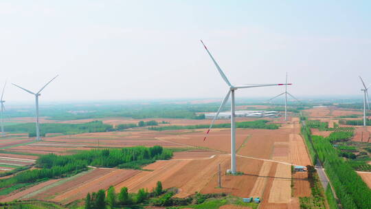 航拍麦地里的风车-风力发电新能源视频素材模板下载
