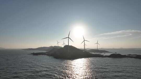 大海日出风车航拍海岛海上发电海洋风力发电