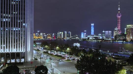 航拍商务办公楼建筑外立面灯光夜景