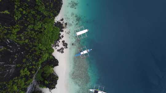 船的空中视频，绿松石水颜色尼多巴拉望菲律宾