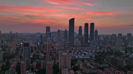 无锡城市航拍城市延时无锡市中心日落晚霞视频素材模板下载