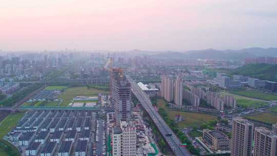 日出晨曦中的杭州滨江城市建筑风景航拍